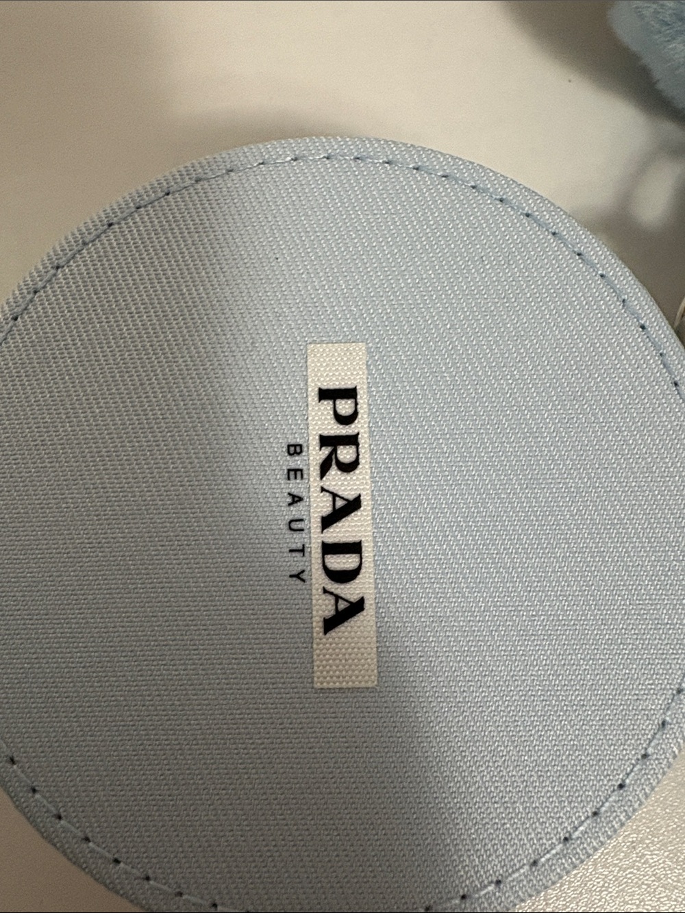 Prada Beauty Round Case with blue wristlet pouch and keychain - Picture 2 of 11